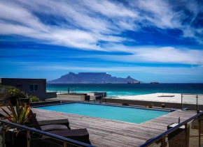 Отель Heaven-on-Earth : Blouberg beachfront apartment  Блоуберг